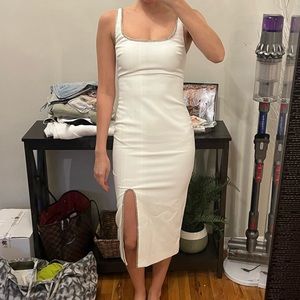 Likely white beaded dress